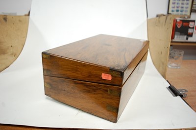 Lot 160 - A Victorian rosewood and brass bound writing...