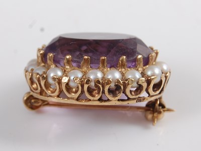 Lot 1209 - A 9ct yellow gold, amethyst and seed pearl...