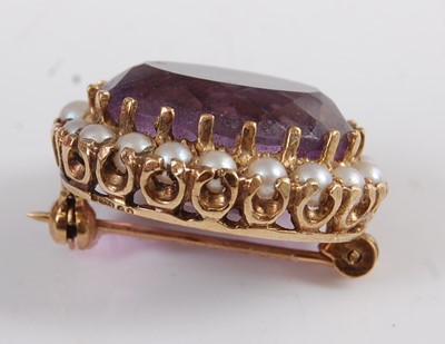 Lot 1209 - A 9ct yellow gold, amethyst and seed pearl...