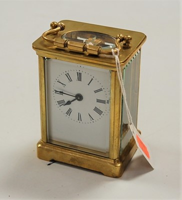 Lot 202 - A lacquered brass cased carriage clock, having...