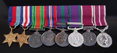 Lot 130 - A miniature group of eight medals to include
