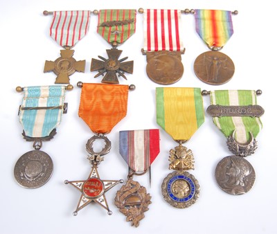 Lot 76 - A collection of nine European/North African medals/decorations