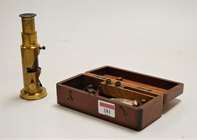 Lot 281 - A 19th century brass monocular microscope, cased