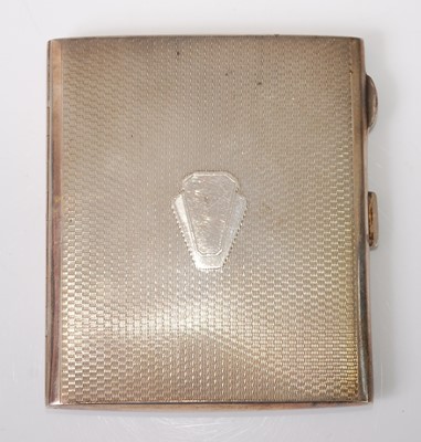 Lot 77 - An Art Deco silver pocket cigarette case,...
