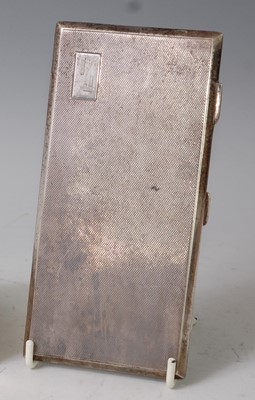Lot 79 - A large late Art Deco silver pocket cigarette...