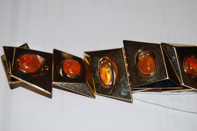 Lot 118 - A 1970s 14ct gold and fire-opal set bracelet,...