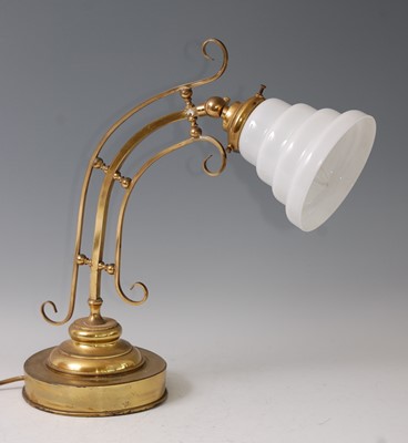 Lot 127 - An Art Nouveau lacquered brass table lamp,...