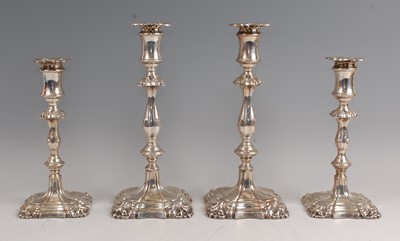 Lot 1111 - A set of four Edwardian silver table...