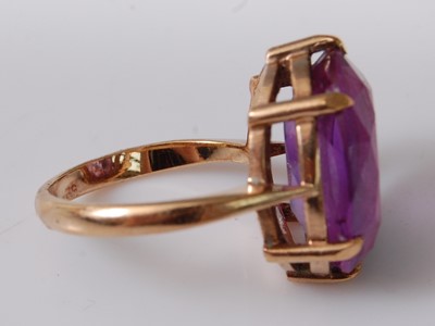 Lot 2501 - A 9ct yellow gold and synthetic purple...