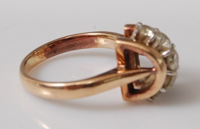Lot 2504 - A yellow metal diamond five-stone ring, the...