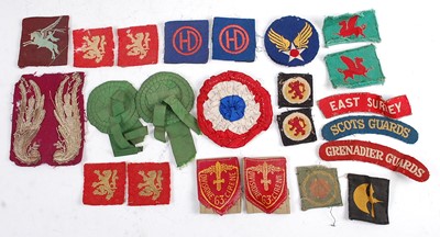 Lot 63 - A large collection of cloth insignia