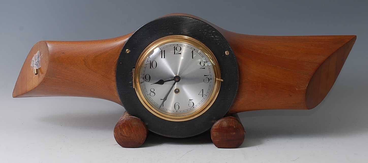 Lot 6 - An early 20th century propeller mantel clock