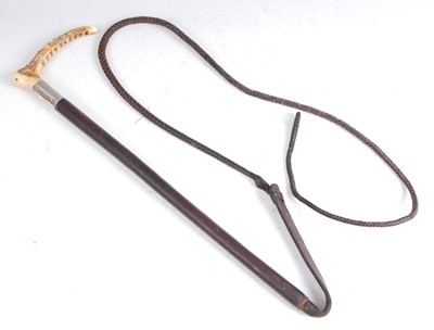 Lot 237 - An early 20th century plaited leather riding crop