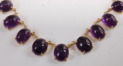 Lot 1219 - A yellow metal and amethyst fringe necklet,...