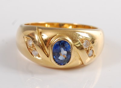 Lot 1220 - An 18ct yellow gold, sapphire and diamond...