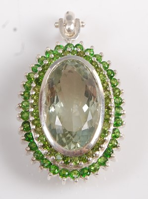 Lot 2542 - A sterling silver prasiolite and diopside oval...