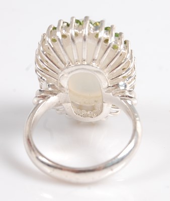 Lot 2573 - A white metal, moonstone and diopside oval...