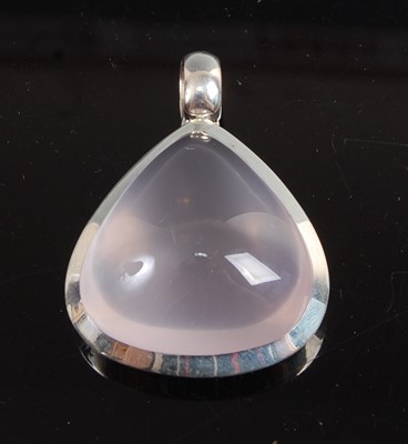 Lot 2575 - A white metal pear shaped rose quartz pendant,...