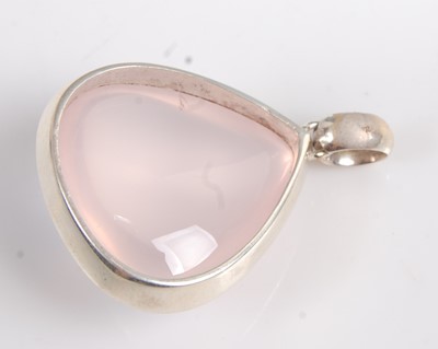 Lot 2575 - A white metal pear shaped rose quartz pendant,...