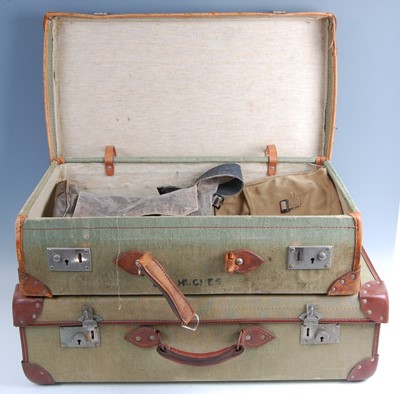 Lot 88 - A post WW II canvas clad and leather bound military suitcase