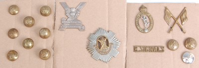 Lot 90 - A small collection of military badges and buttons to include