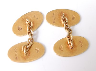 Lot 1197 - A pair of 18ct yellow gold double-ended oval...