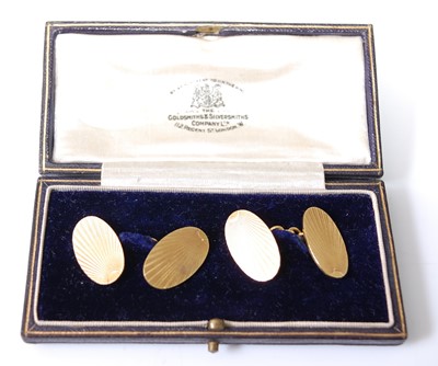 Lot 1197 - A pair of 18ct yellow gold double-ended oval...
