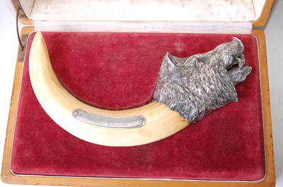 Lot 1312 - A silver mounted wild boar’s tusk cigar-cutter,...