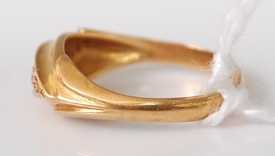 Lot 308 - An 18ct yellow gold diamond dress ring, the...