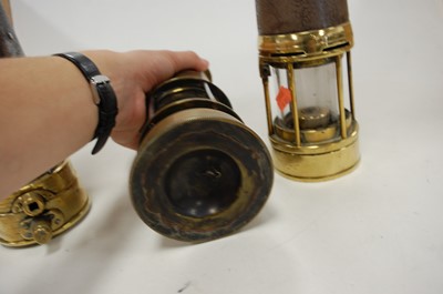 Lot 9 - A brass safety lamp, having a copper plaque...