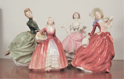 Lot 19 - A collection of four Royal Doulton figures,...