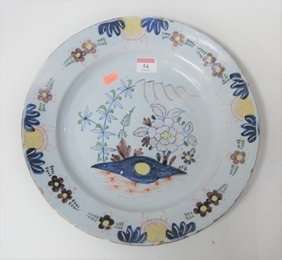 Lot 54 - An 18th century Delft charger, the centre...