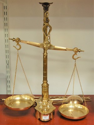 Lot 63 - A set of large brass pan scales and weights...