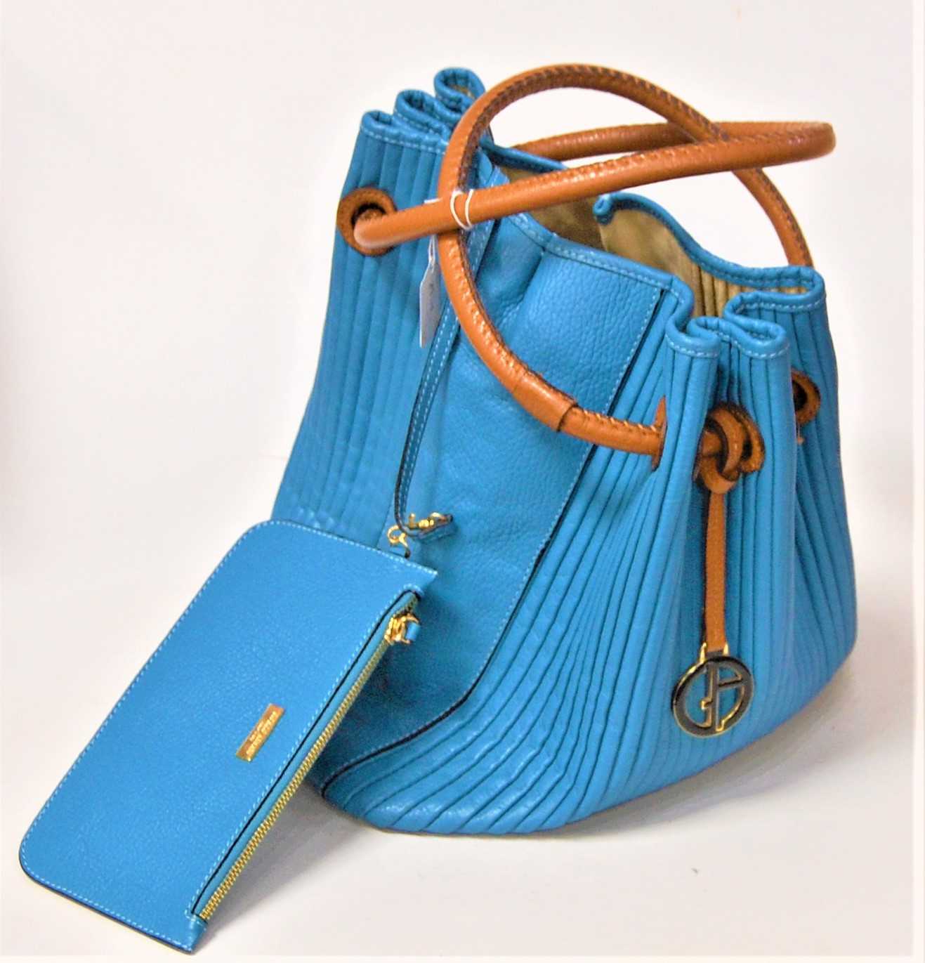 Lot 155 - A ladies Georgio Armani blue leather hand bag...
