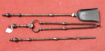 Lot 171 - A set of three 19th century steel fire tools...