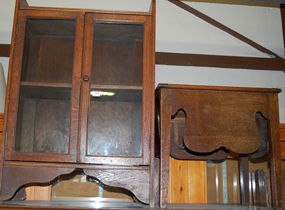 Lot 1210 - A small 1930s double door glazed bookcase,...