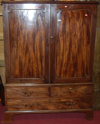 Lot 1211 - A 19th century mahogany double door press...