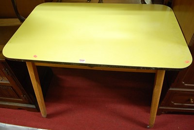 Lot 1224 - A 1960s yellow formica topped kitchen table, w....