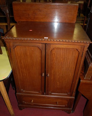 Lot 1227 - An early 20th century mahogany double door...