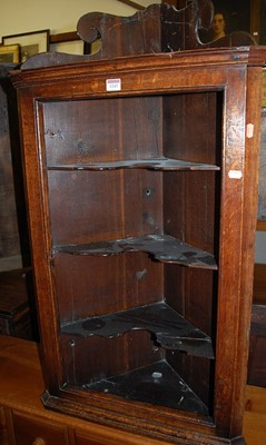 Lot 1243 - A 19th century provincial oak open hanging...