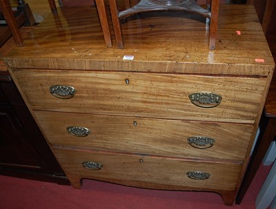 Lot 1249 - A 19th century mahogany chest, of three long...