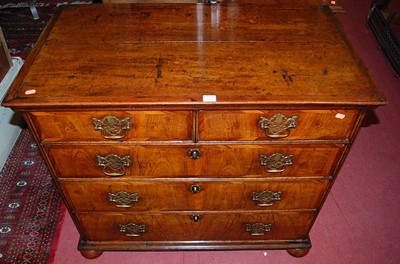 Lot 1261 - An 18th century oak figured walnut and...