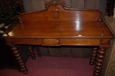 Lot 1264 - A Victorian oak scroll ledgeback hall table,...