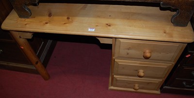 Lot 1275 - A modern pine round cornered single pedestal...