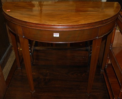 Lot 1294 - An early 19th century mahogany demi-lune...