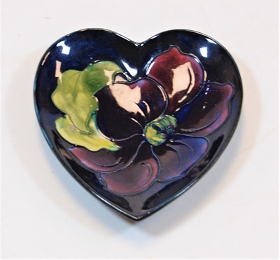 Lot 234 - A Moorcroft Pottery heart shaped pin dish, on...