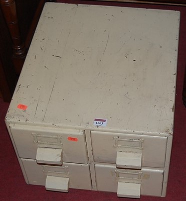 Lot 1303 - A 1930s cream painted four drawer table top...