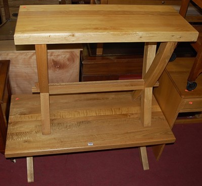 Lot 1305 - A contemporary light oak X-frame rectangular...