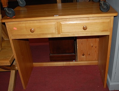 Lot 1308 - A contemporary light ash two-drawer side table,...