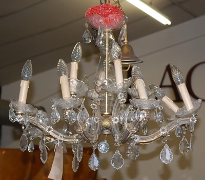 Lot 1322 - A cut crystal glass hanging electrolier having...